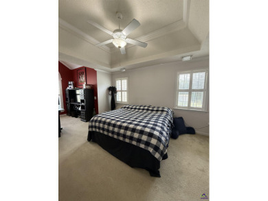 Welcome to this spacious 4-bedroom, 2-bath home in the highly on The International City Golf Course in Georgia - for sale on GolfHomes.com, golf home, golf lot