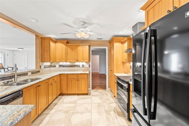 Welcome to your dream home in one of Dunedin's most desirable on The Dunedin Country Club in Florida - for sale on GolfHomes.com, golf home, golf lot
