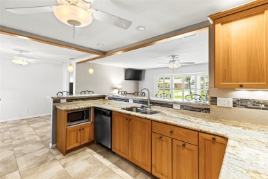Welcome to your dream home in one of Dunedin's most desirable on The Dunedin Country Club in Florida - for sale on GolfHomes.com, golf home, golf lot