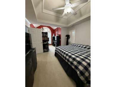 Welcome to this spacious 4-bedroom, 2-bath home in the highly on The International City Golf Course in Georgia - for sale on GolfHomes.com, golf home, golf lot