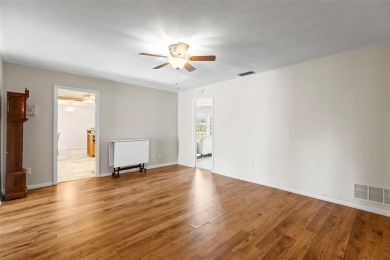 Welcome to your dream home in one of Dunedin's most desirable on The Dunedin Country Club in Florida - for sale on GolfHomes.com, golf home, golf lot