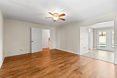 Welcome to your dream home in one of Dunedin's most desirable on The Dunedin Country Club in Florida - for sale on GolfHomes.com, golf home, golf lot