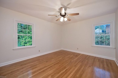 Welcome to this beautifully updated 5 bedroom, 3 bath home that on Cedar Point Country Club in Virginia - for sale on GolfHomes.com, golf home, golf lot