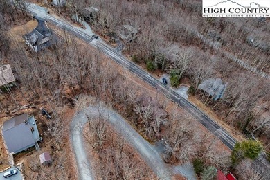 Gently sloping, road-to-road homesite located at 131 Clubhouse on Beech Mountain Club in North Carolina - for sale on GolfHomes.com, golf home, golf lot