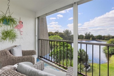 Gorgeous corner unit with stunning water views in strong condo on Inverrary Country Club in Florida - for sale on GolfHomes.com, golf home, golf lot