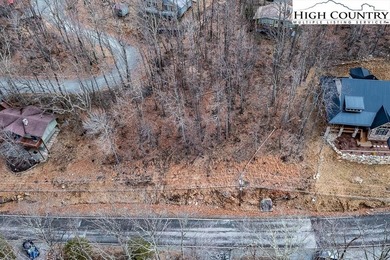 Gently sloping, road-to-road homesite located at 131 Clubhouse on Beech Mountain Club in North Carolina - for sale on GolfHomes.com, golf home, golf lot