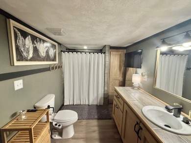 This stunning 2-bedroom, 2-bath partially furnished manufactured on Pendleton Harbor in Texas - for sale on GolfHomes.com, golf home, golf lot