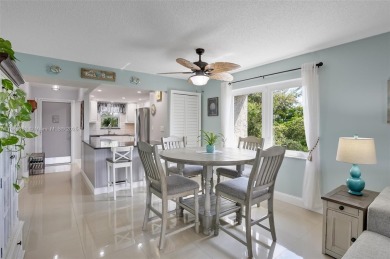 Gorgeous corner unit with stunning water views in strong condo on Inverrary Country Club in Florida - for sale on GolfHomes.com, golf home, golf lot