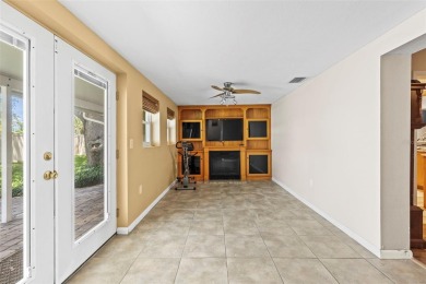 Welcome to your dream home in one of Dunedin's most desirable on The Dunedin Country Club in Florida - for sale on GolfHomes.com, golf home, golf lot