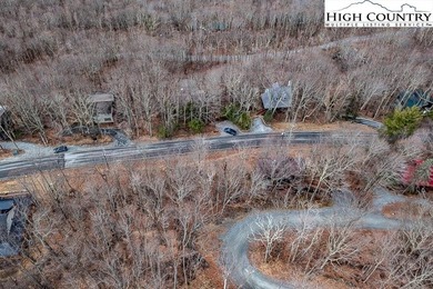 Gently sloping, road-to-road homesite located at 131 Clubhouse on Beech Mountain Club in North Carolina - for sale on GolfHomes.com, golf home, golf lot