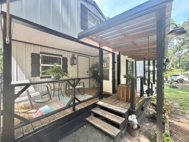 This stunning 2-bedroom, 2-bath partially furnished manufactured on Pendleton Harbor in Texas - for sale on GolfHomes.com, golf home, golf lot