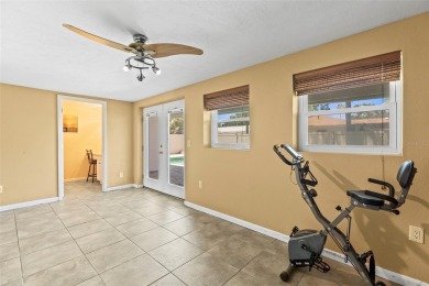 Welcome to your dream home in one of Dunedin's most desirable on The Dunedin Country Club in Florida - for sale on GolfHomes.com, golf home, golf lot