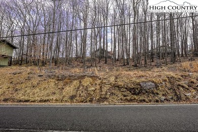 Gently sloping, road-to-road homesite located at 131 Clubhouse on Beech Mountain Club in North Carolina - for sale on GolfHomes.com, golf home, golf lot