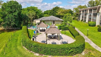Gorgeous corner unit with stunning water views in strong condo on Inverrary Country Club in Florida - for sale on GolfHomes.com, golf home, golf lot