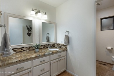 Experience fairway living at its finest in this beautiful home on Pinetop Lakes Golf and Country Club in Arizona - for sale on GolfHomes.com, golf home, golf lot