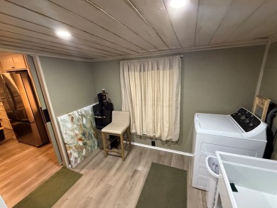 This stunning 2-bedroom, 2-bath partially furnished manufactured on Pendleton Harbor in Texas - for sale on GolfHomes.com, golf home, golf lot