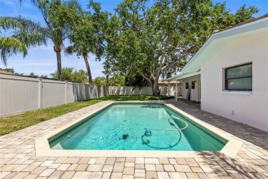 Welcome to your dream home in one of Dunedin's most desirable on The Dunedin Country Club in Florida - for sale on GolfHomes.com, golf home, golf lot