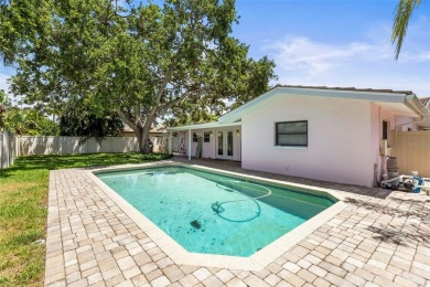 Welcome to your dream home in one of Dunedin's most desirable on The Dunedin Country Club in Florida - for sale on GolfHomes.com, golf home, golf lot