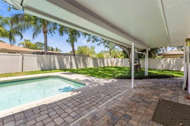 Welcome to your dream home in one of Dunedin's most desirable on The Dunedin Country Club in Florida - for sale on GolfHomes.com, golf home, golf lot