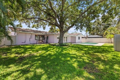 Welcome to your dream home in one of Dunedin's most desirable on The Dunedin Country Club in Florida - for sale on GolfHomes.com, golf home, golf lot