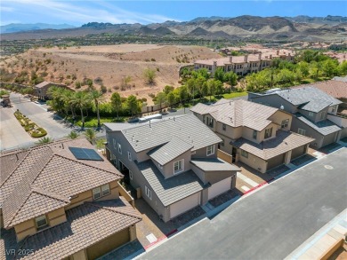 Nestled within a picturesque embrace of a serene lake and golf on Reflection Bay Golf Club in Nevada - for sale on GolfHomes.com, golf home, golf lot