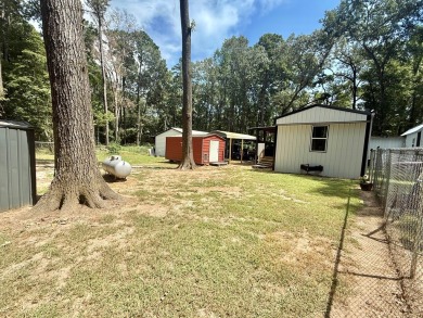 This stunning 2-bedroom, 2-bath partially furnished manufactured on Pendleton Harbor in Texas - for sale on GolfHomes.com, golf home, golf lot