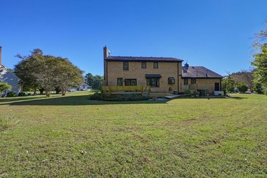 Welcome to this beautifully updated 5 bedroom, 3 bath home that on Cedar Point Country Club in Virginia - for sale on GolfHomes.com, golf home, golf lot