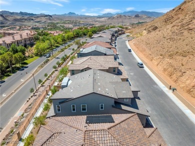 Nestled within a picturesque embrace of a serene lake and golf on Reflection Bay Golf Club in Nevada - for sale on GolfHomes.com, golf home, golf lot
