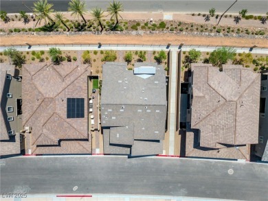 Nestled within a picturesque embrace of a serene lake and golf on Reflection Bay Golf Club in Nevada - for sale on GolfHomes.com, golf home, golf lot