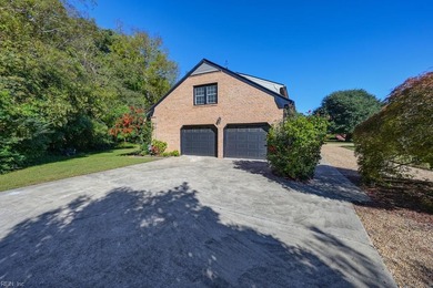 Welcome to this beautifully updated 5 bedroom, 3 bath home that on Cedar Point Country Club in Virginia - for sale on GolfHomes.com, golf home, golf lot