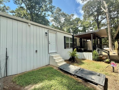 This stunning 2-bedroom, 2-bath partially furnished manufactured on Pendleton Harbor in Texas - for sale on GolfHomes.com, golf home, golf lot