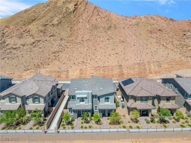 Nestled within a picturesque embrace of a serene lake and golf on Reflection Bay Golf Club in Nevada - for sale on GolfHomes.com, golf home, golf lot