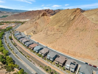 Nestled within a picturesque embrace of a serene lake and golf on Reflection Bay Golf Club in Nevada - for sale on GolfHomes.com, golf home, golf lot