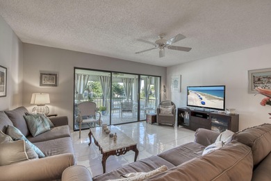 Welcome to this thoughtfully updated home on the second floor on Old Marsh Golf Club in Florida - for sale on GolfHomes.com, golf home, golf lot