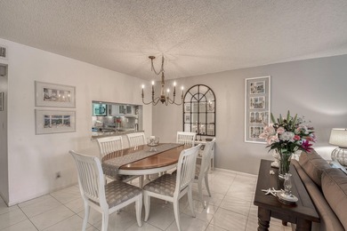 Welcome to this thoughtfully updated home on the second floor on Old Marsh Golf Club in Florida - for sale on GolfHomes.com, golf home, golf lot