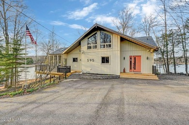 Stunning Roamingwood Lakefront Retreat in The Hideout - Fully on The Hideout Golf in Pennsylvania - for sale on GolfHomes.com, golf home, golf lot