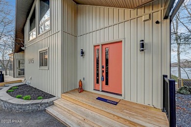 Stunning Roamingwood Lakefront Retreat in The Hideout - Fully on The Hideout Golf in Pennsylvania - for sale on GolfHomes.com, golf home, golf lot