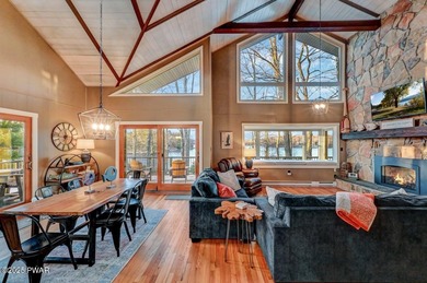 Stunning Roamingwood Lakefront Retreat in The Hideout - Fully on The Hideout Golf in Pennsylvania - for sale on GolfHomes.com, golf home, golf lot