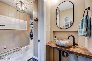 Stunning Roamingwood Lakefront Retreat in The Hideout - Fully on The Hideout Golf in Pennsylvania - for sale on GolfHomes.com, golf home, golf lot