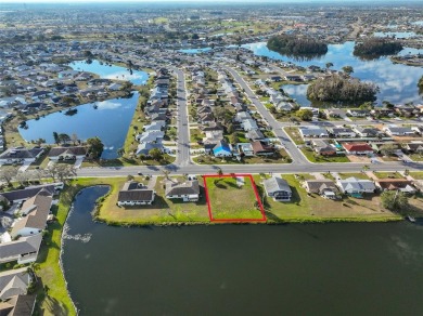 OVERSIZED VACANT LOT WITH 94 FRONT FT OF BEAUTIFUL WATER VIEWS on Caloosa Greens Executive Golf Course in Florida - for sale on GolfHomes.com, golf home, golf lot