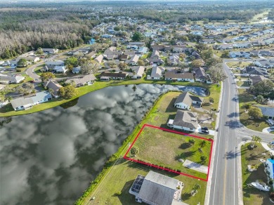 OVERSIZED VACANT LOT WITH 94 FRONT FT OF BEAUTIFUL WATER VIEWS on Caloosa Greens Executive Golf Course in Florida - for sale on GolfHomes.com, golf home, golf lot