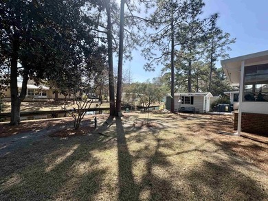 Move-In Ready 55+ Coastal Retreat with Water Views--short golf on Indigo Creek Golf Club in South Carolina - for sale on GolfHomes.com, golf home, golf lot
