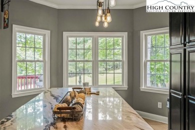 Discover 204 Laurel Cottage, an exquisite retreat within the on Olde Beau Golf Course in North Carolina - for sale on GolfHomes.com, golf home, golf lot