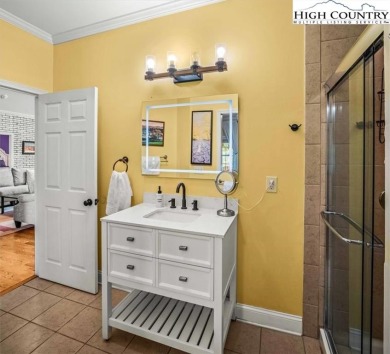 Discover 204 Laurel Cottage, an exquisite retreat within the on Olde Beau Golf Course in North Carolina - for sale on GolfHomes.com, golf home, golf lot