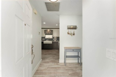 Welcome to this stunning FULLY UPDATED, 2-bedroom, 2-bathroom on Glenview Championship Golf and Country Club in Florida - for sale on GolfHomes.com, golf home, golf lot