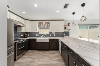 Welcome to this stunning FULLY UPDATED, 2-bedroom, 2-bathroom on Glenview Championship Golf and Country Club in Florida - for sale on GolfHomes.com, golf home, golf lot