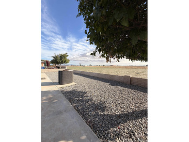 Spectacular deal for a two-bedroom home in town!! Needs a *tad* on Desert Hills Golf Course in Arizona - for sale on GolfHomes.com, golf home, golf lot