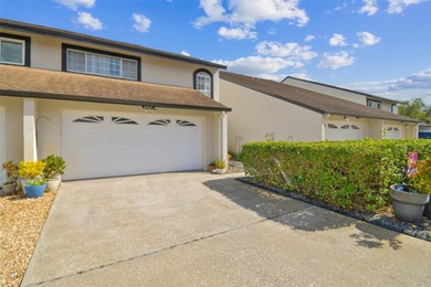 Beautifully maintained townhouse ideally situated on Meadow #1 on Carrollwood Country Club in Florida - for sale on GolfHomes.com, golf home, golf lot