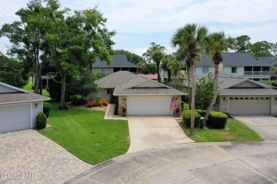 Welcome to this impeccably maintained one level home located in on Plantation Bay Golf and Country Club in Florida - for sale on GolfHomes.com, golf home, golf lot
