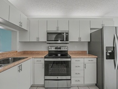 Welcome to this well-maintained second-floor condo offering 2 on  in Florida - for sale on GolfHomes.com, golf home, golf lot